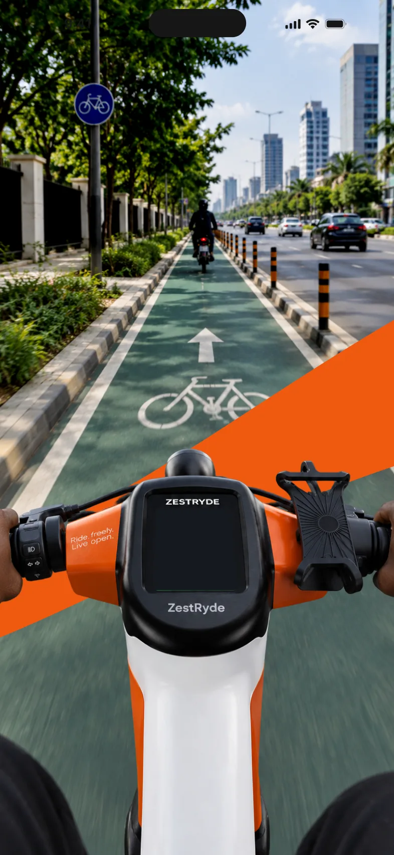 Handlebar view of a ZestRyde bike on a green cycle lane